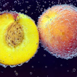 impressive closeup photo of sliced fruit with bubbles